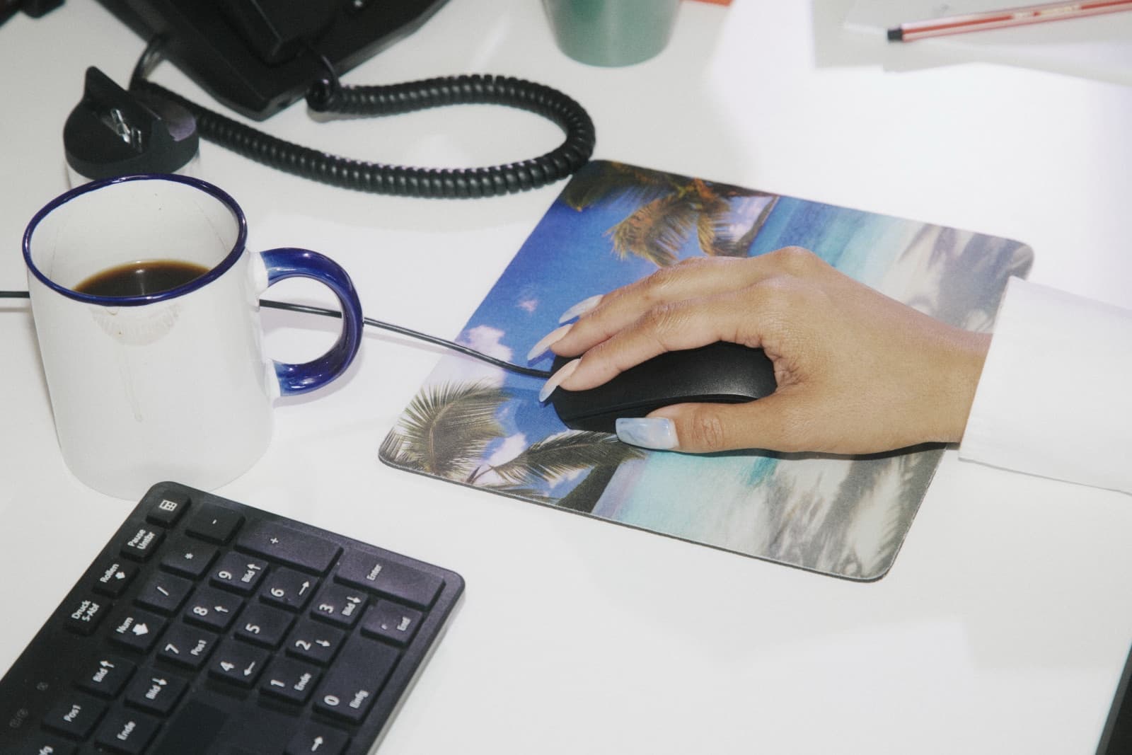 Person testing a website on a laptop